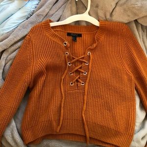 Dark orange sweater